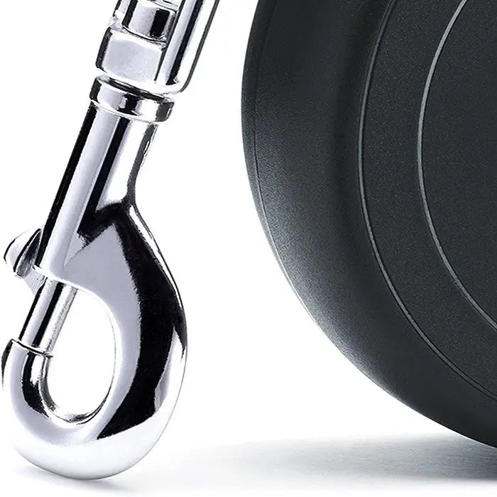 Close-up of a chrome hook attached to a durable retractable leash for pets.