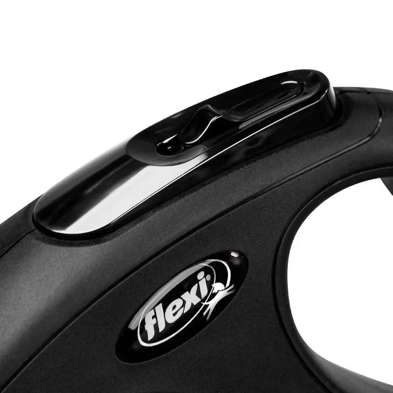 Close-up of a Flexi retractable dog leash handle with ergonomic design and button for easy control.