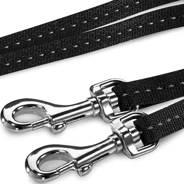 Durable black dog leash with sturdy metal clips for secure attachment.
