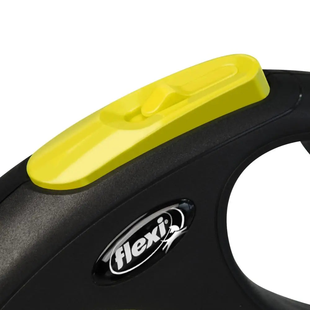 Flexi retractable dog leash handle with a bright yellow button for easy control and comfort.