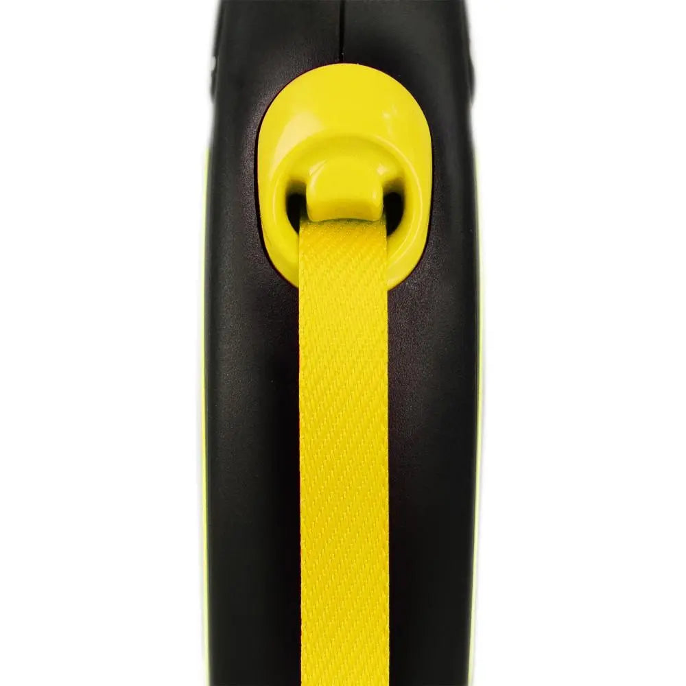 Yellow retractable dog leash with a sturdy black handle for easy grip and control.