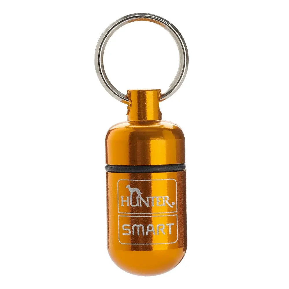Orange dog tag holder keychain for pet identification and safety.