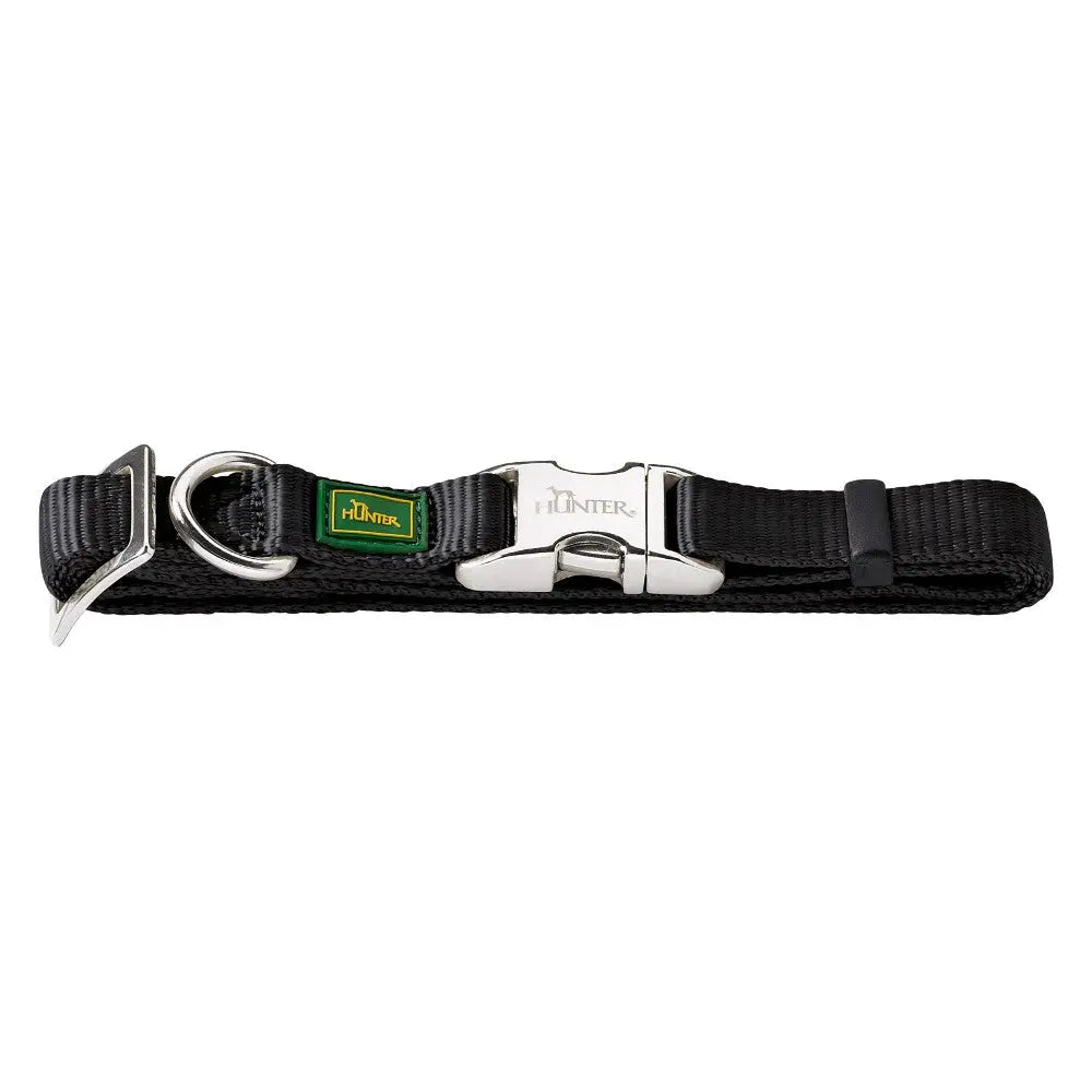 Durable black dog collar with metal buckle and adjustable strap for secure fit.