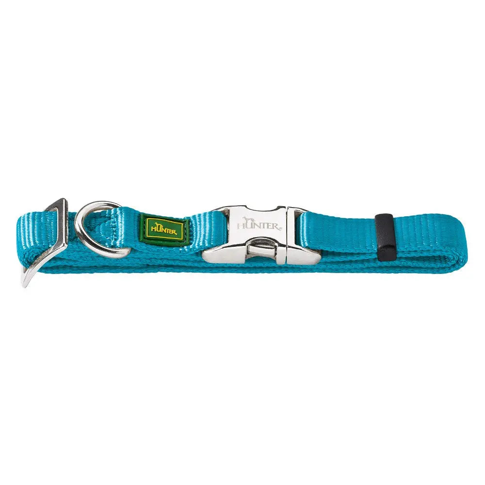 Durable turquoise dog collar with metal buckle and adjustable strap for comfort and style.