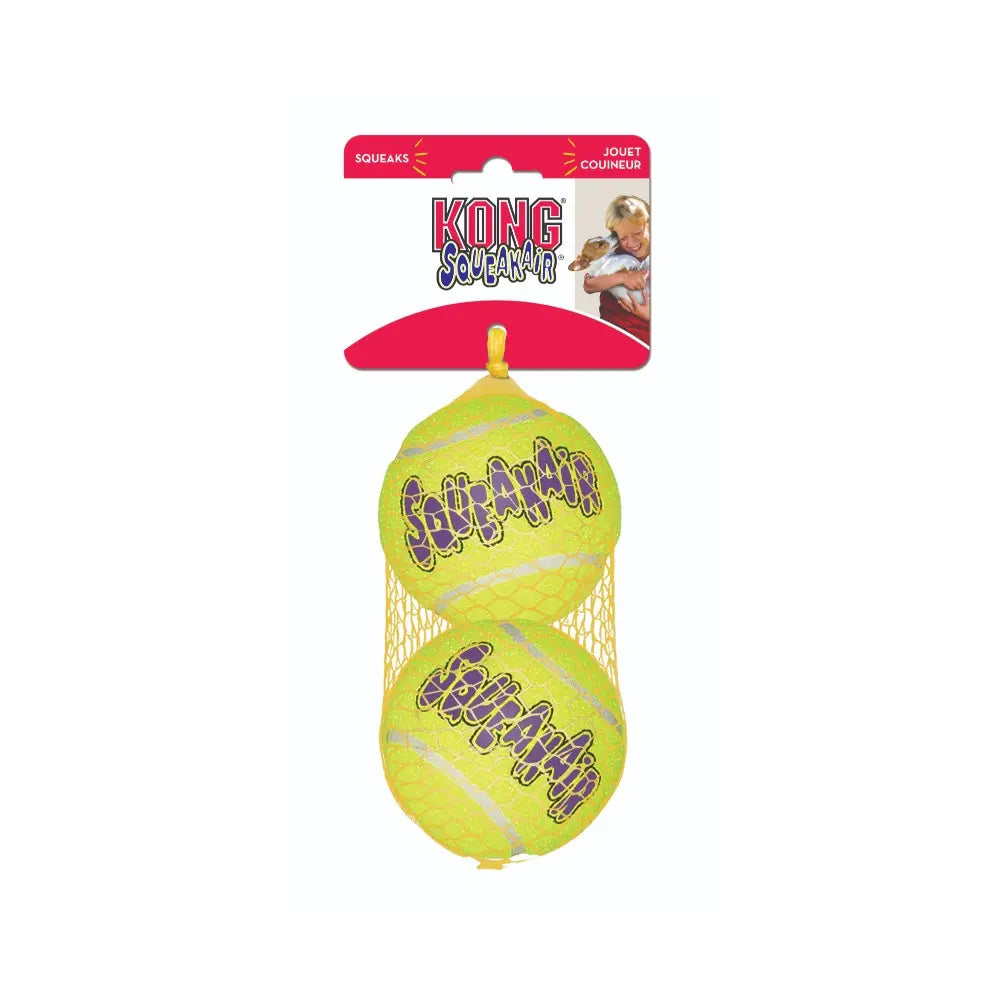 KONG Squeakair dog toy set featuring two bright yellow tennis balls in a mesh packaging.