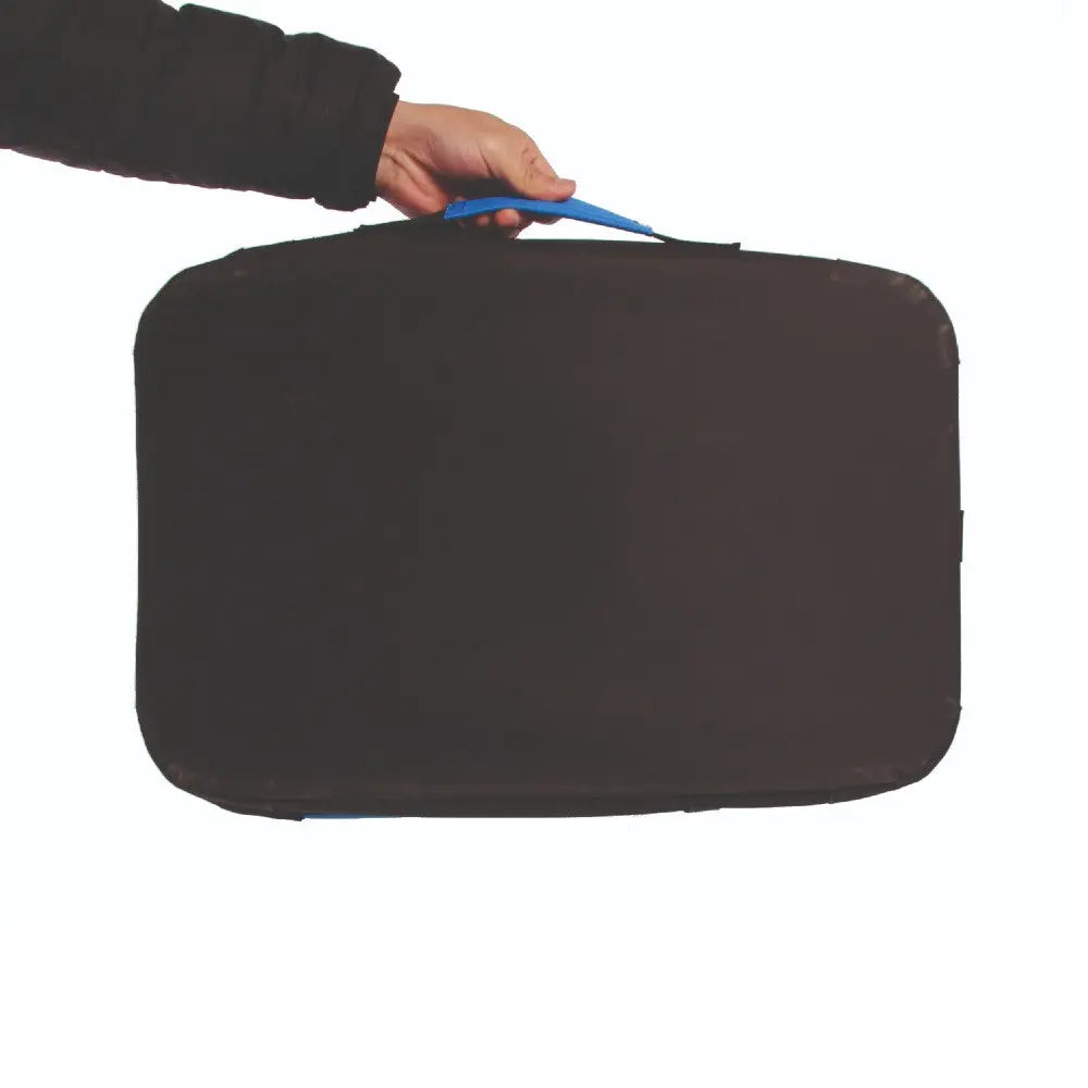 Hand holding a black carrying case with a blue handle, ideal for travel and storage.