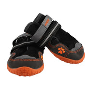 Dog shoes with adjustable straps for protection and comfort on various terrains.