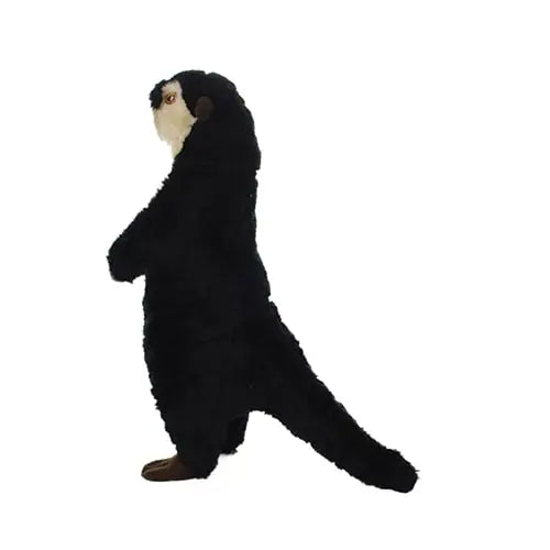 Plush otter toy standing upright, perfect for cuddling and playtime.