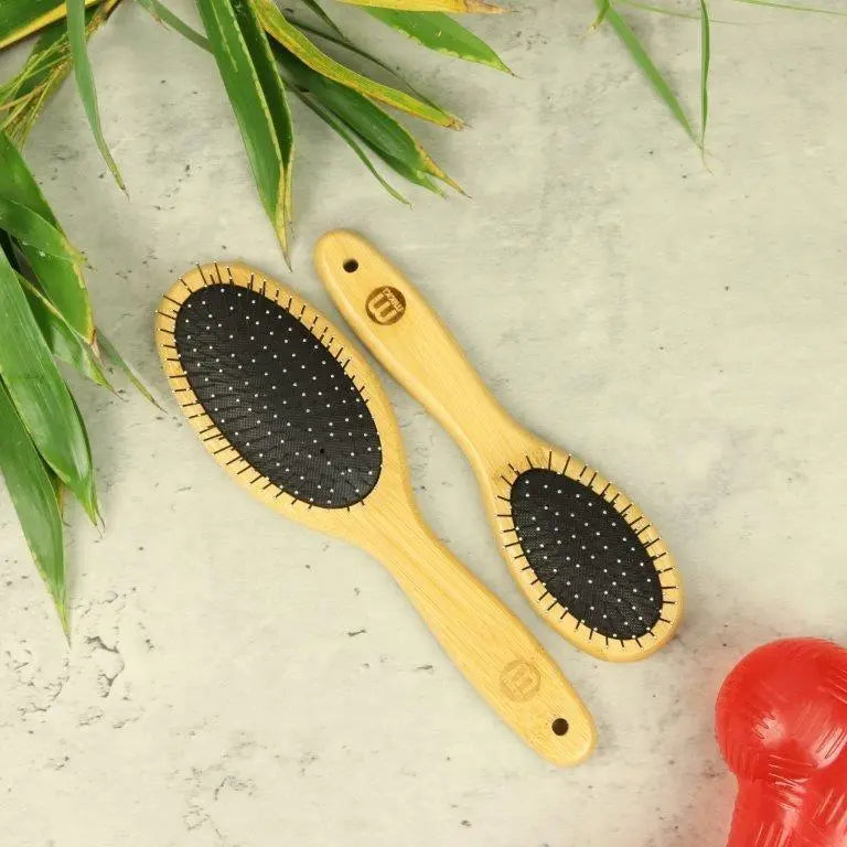 Natural bamboo hairbrushes with soft bristles for gentle detangling and styling.