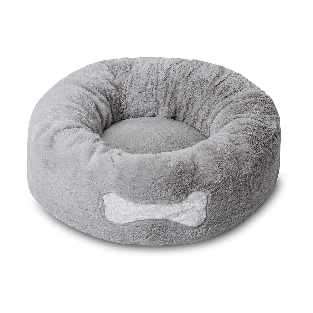 Cozy gray dog bed with plush fabric and a bone-shaped design for ultimate pet comfort.