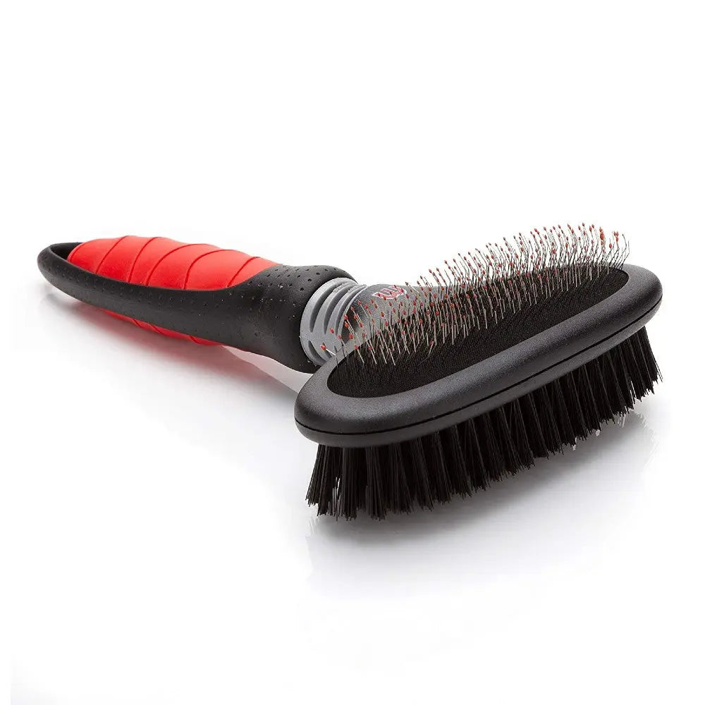 Pet grooming brush with dual bristles for effective shedding and detangling.