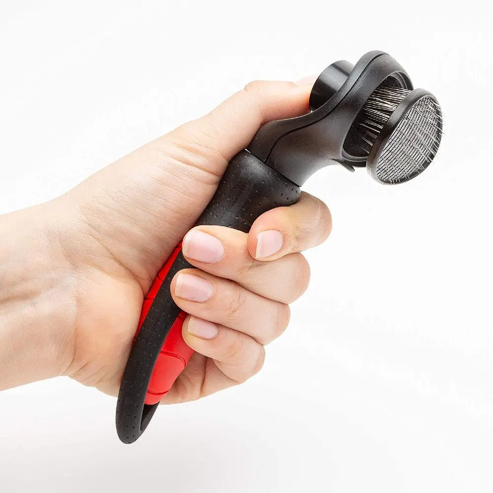 Pet grooming tool with ergonomic handle for effective fur removal and easy use.