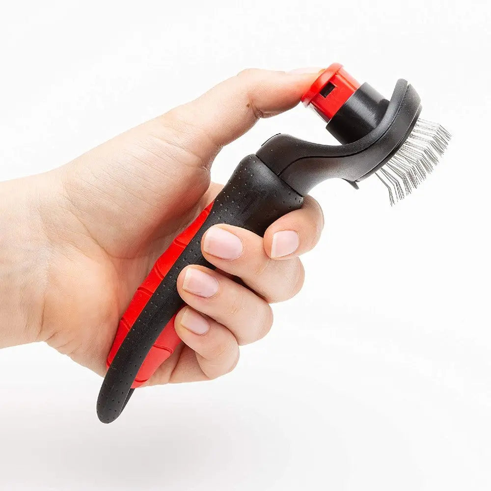Pet grooming tool with ergonomic handle for effective fur removal and easy cleaning.