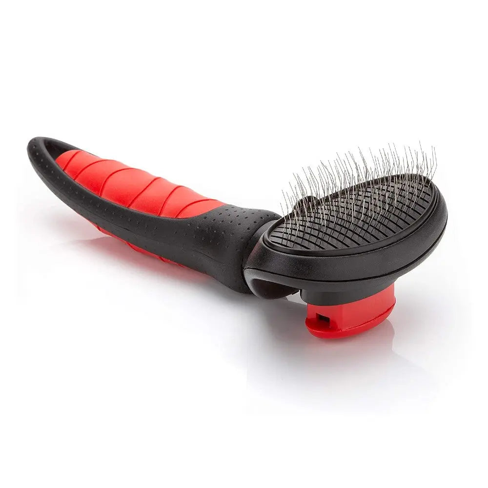 Pet grooming brush with ergonomic handle for effective fur removal and detangling.