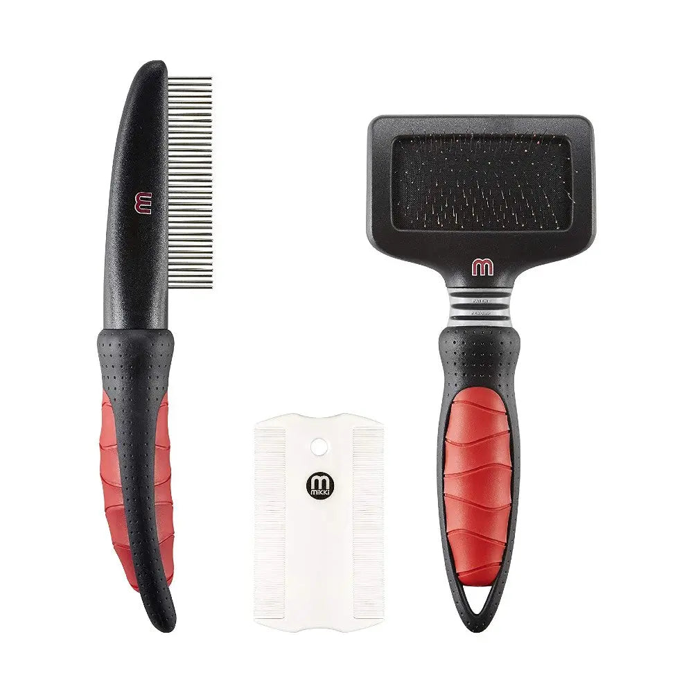 Pet grooming tools set including a comb and brush for effective fur care.
