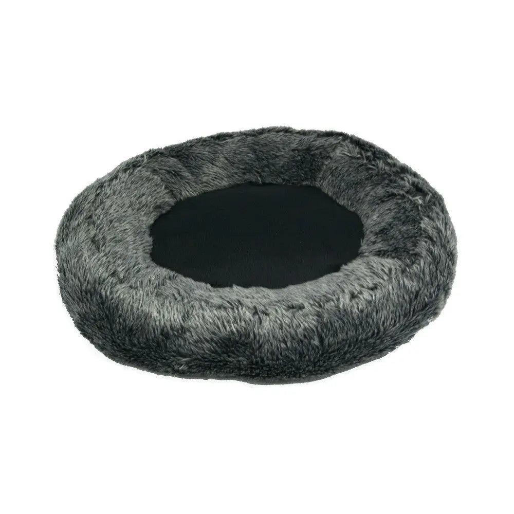 Cozy round pet bed with soft fur lining for ultimate comfort and relaxation.