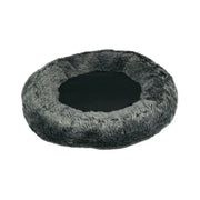 Cozy round pet bed with soft fur lining for ultimate comfort and relaxation.