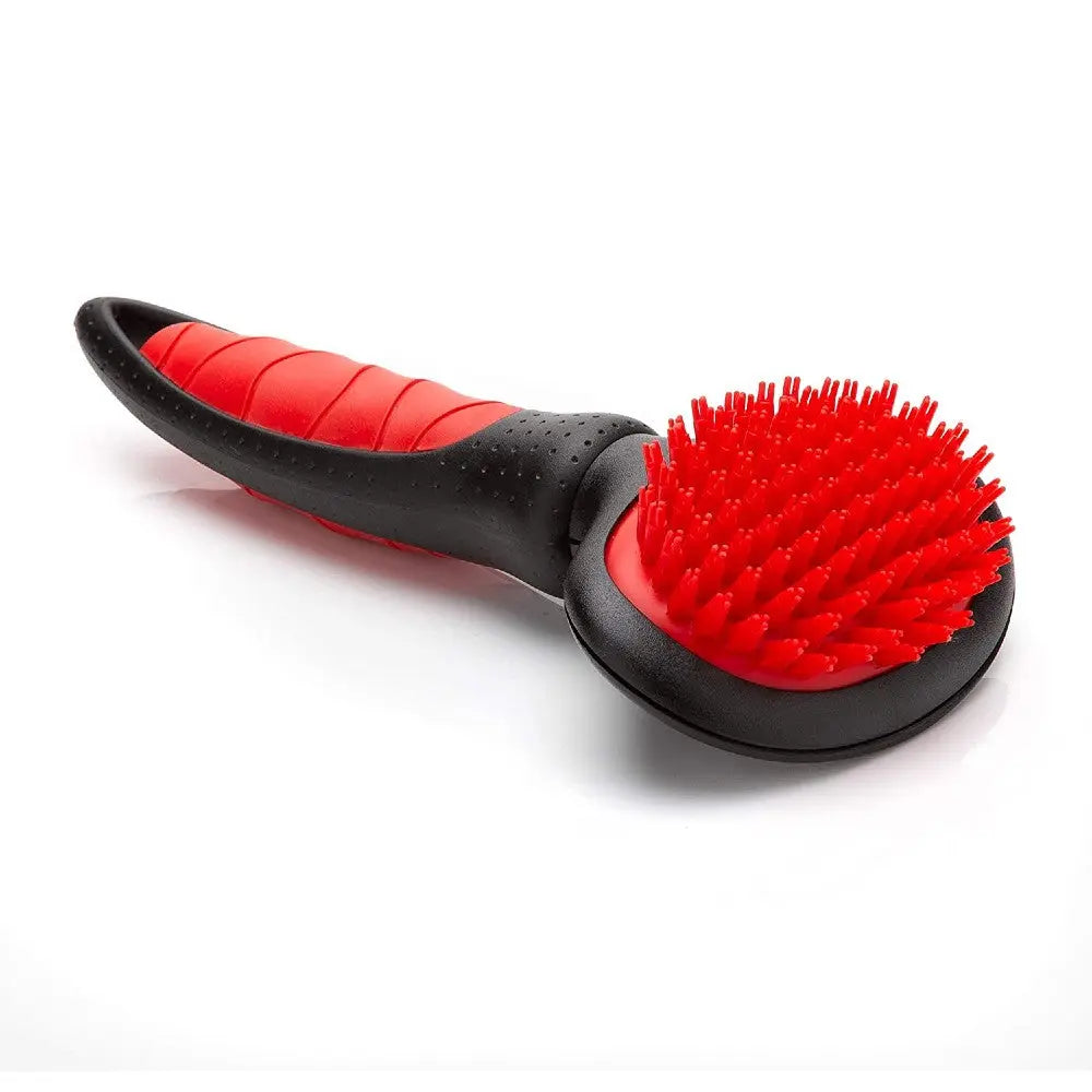 Pet grooming brush with a comfortable grip and soft bristles for effective fur removal.