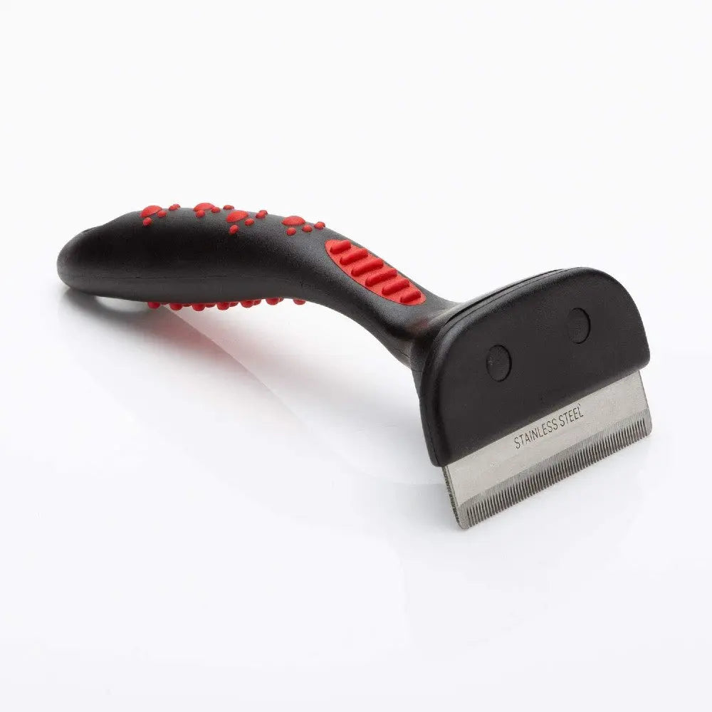 Stainless steel pet grooming tool with a comfortable grip for effective shedding removal.