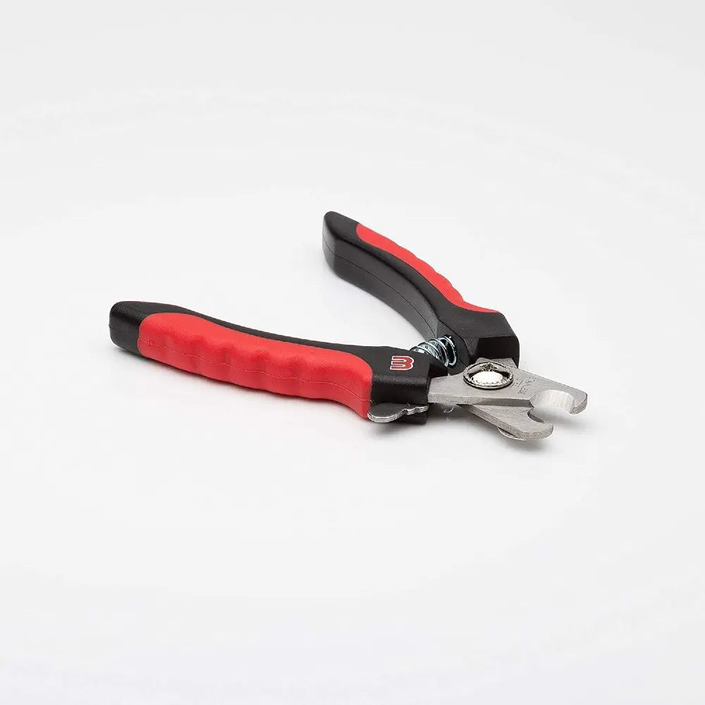 Dog nail clippers with ergonomic red and black handles for easy and safe grooming.
