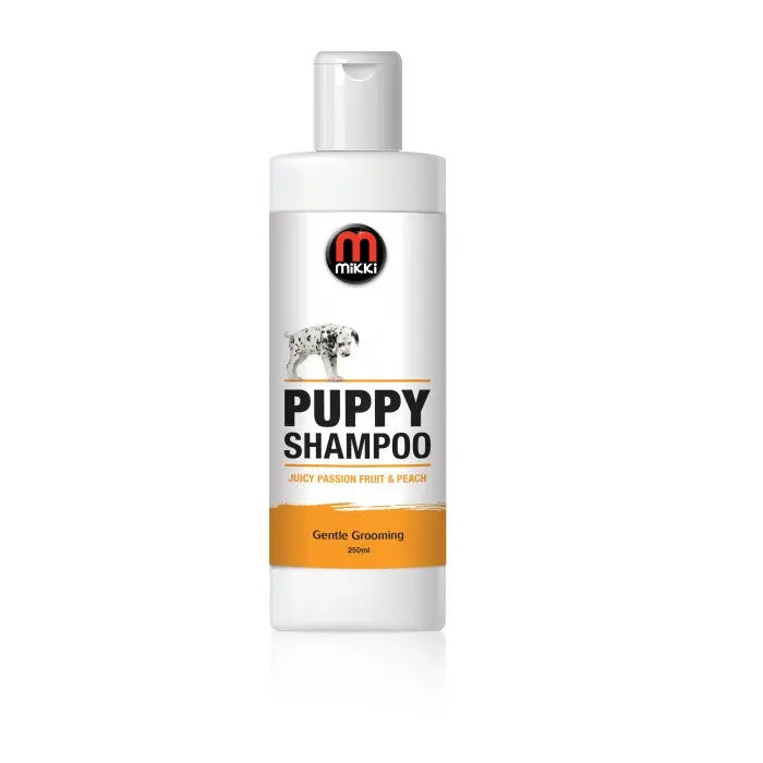 Puppy shampoo bottle featuring juicy passion fruit and peach for gentle grooming.