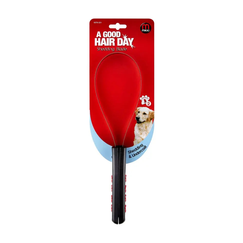 Red shedding brush for dogs, designed for effective grooming and reducing loose hair.