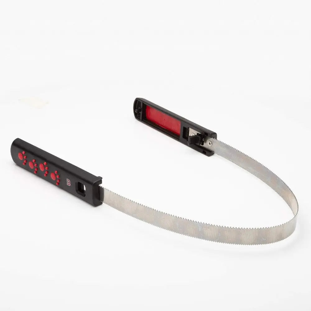 Pet grooming tool with a flexible blade for effective fur removal and easy cleaning.