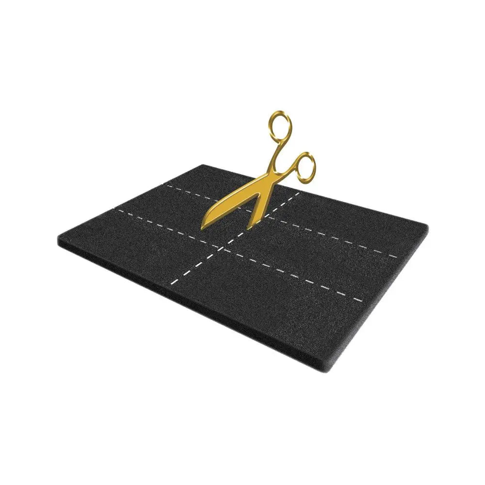 Cutting mat with scissors, marked grid lines for precise cutting and crafting projects.