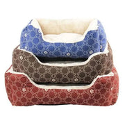 Cozy pet beds in blue, brown, and red with soft interiors for ultimate comfort and style.