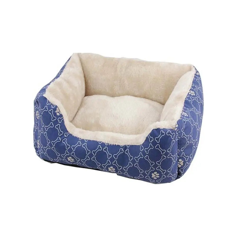 Cozy blue pet bed with soft interior, perfect for small dogs or cats to relax and sleep comfortably.