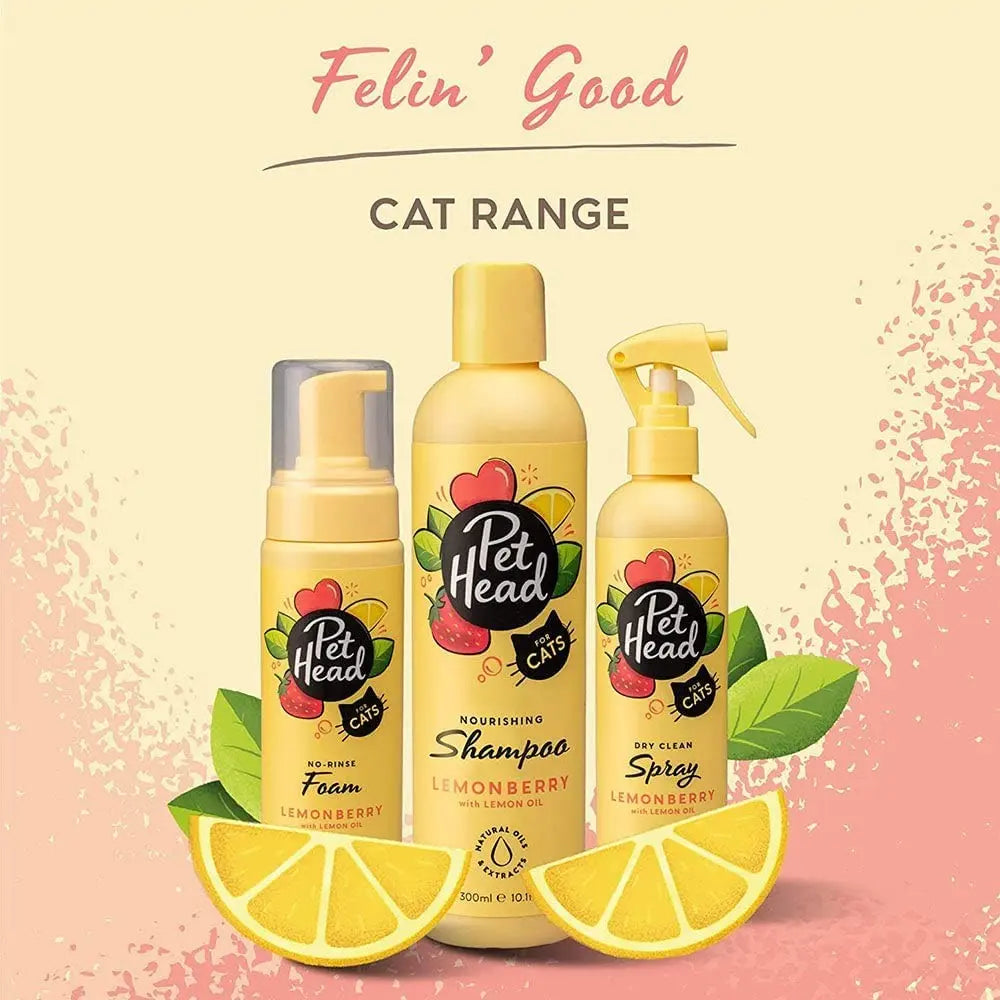 Pet Head cat grooming products featuring lemonberry shampoo, foam, and spray with vibrant citrus design.