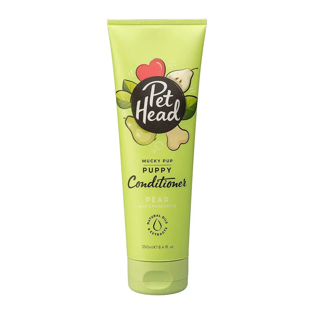 Pet Head Mucky Pup puppy conditioner with pear and chamomile for clean, soft fur.