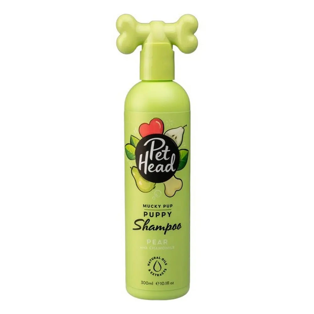 Pet Head Mucky Pup puppy shampoo in pear scent, featuring a playful bone-shaped cap.