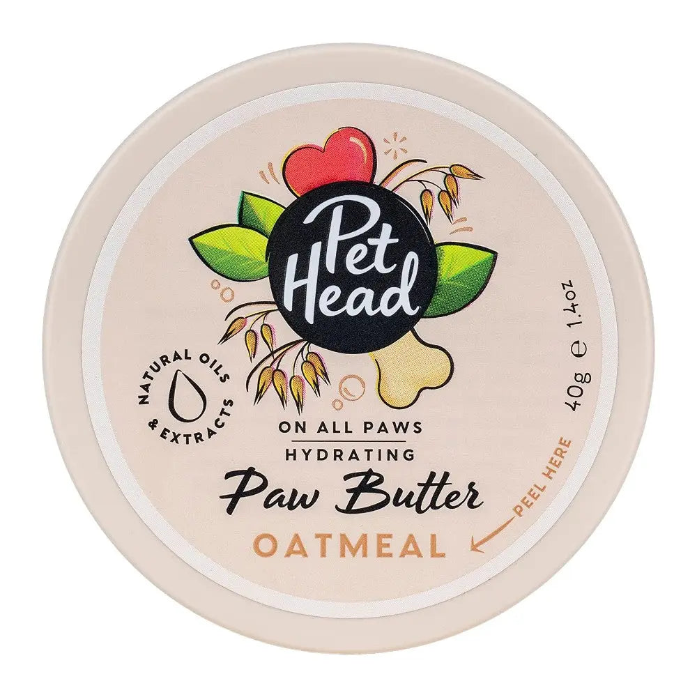 Pet Head Paw Butter in oatmeal scent, hydrating formula for pet paw care.