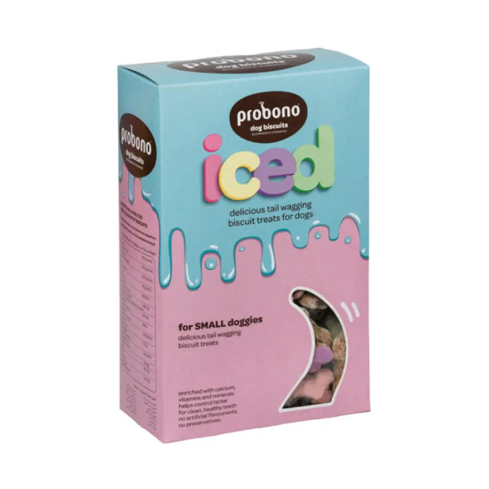 Iced dog biscuits in colorful packaging, perfect treats for small dogs.