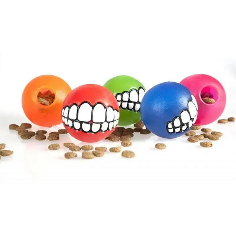 Colorful dog toys with funny teeth designs, perfect for playful pets and interactive fun.