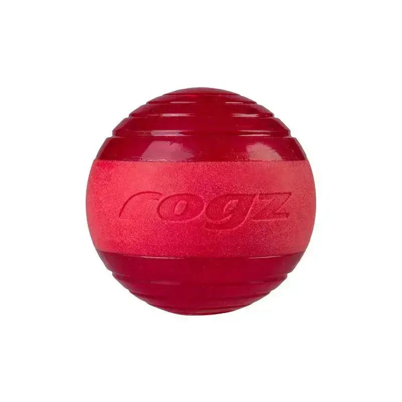Red rubber dog ball toy for interactive play and exercise.