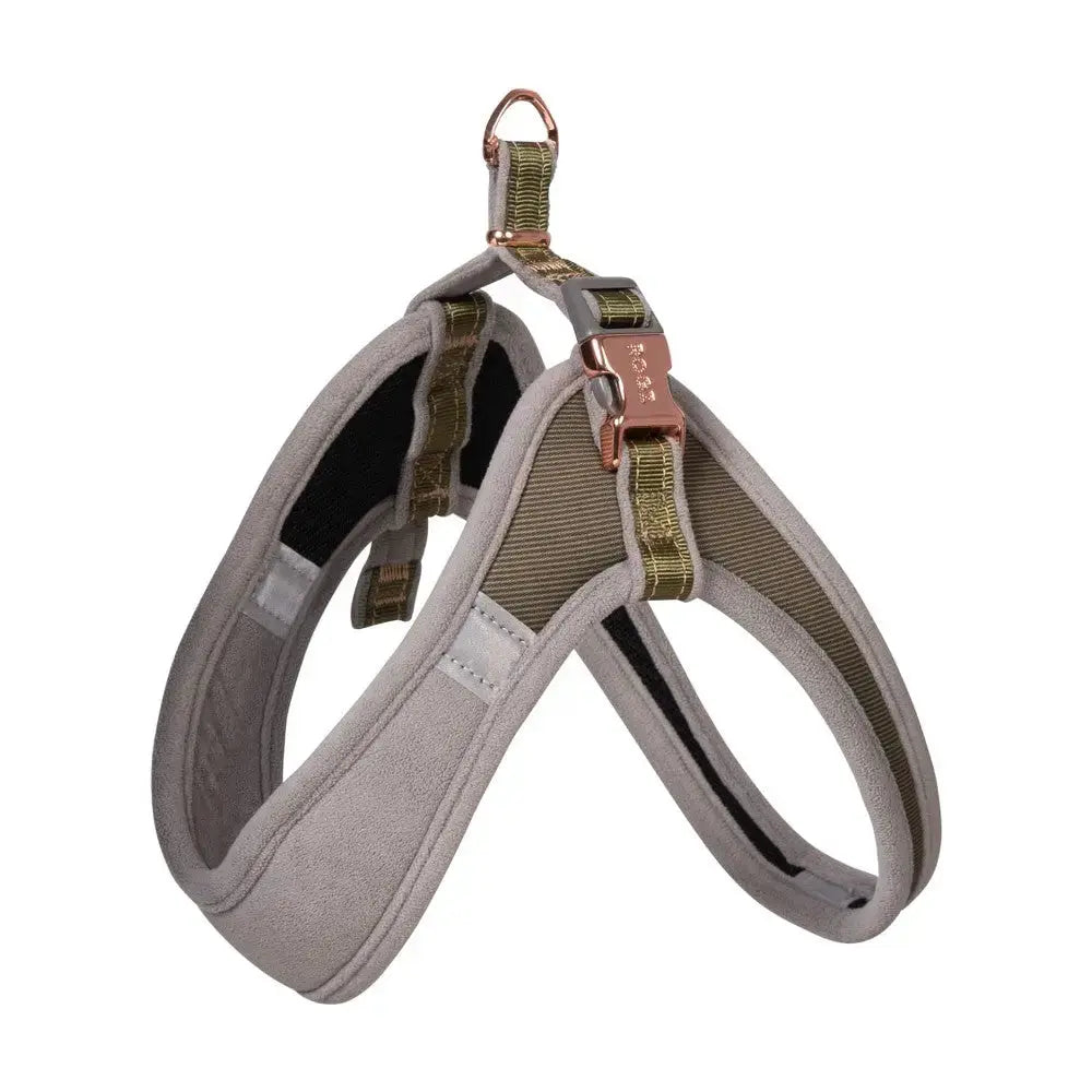 Dog harness in a neutral color with adjustable straps and metal clips for secure fit and comfort.
