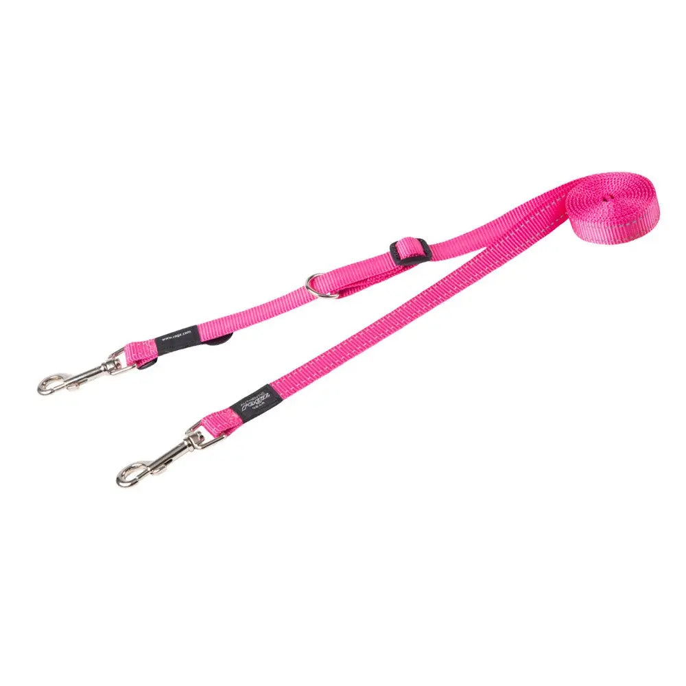 Pink dual-clip dog leash for easy control and training during walks.