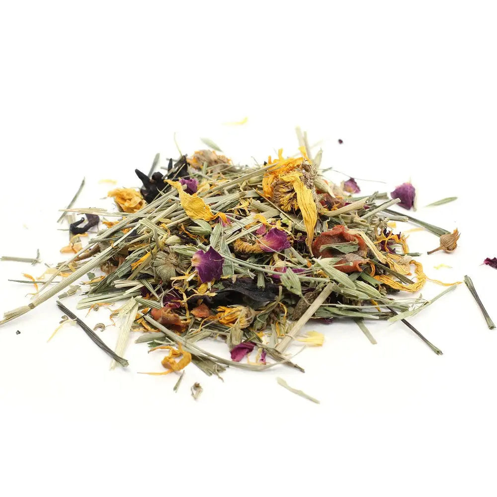 Dried herbal blend with colorful petals and leaves for natural remedies and teas.