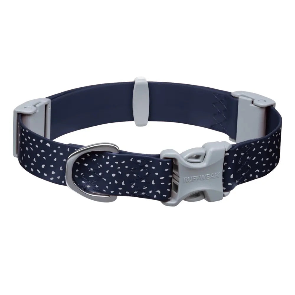 Navy dog collar with heart pattern, adjustable fit, and secure buckle for comfort and style.