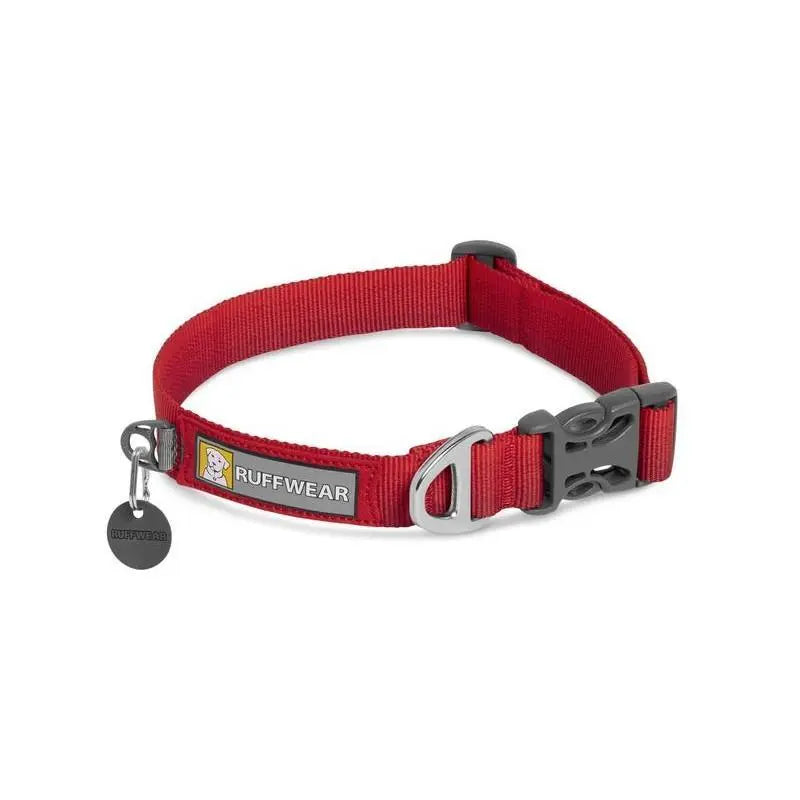 Red dog collar with adjustable strap and secure buckle for comfortable pet wear.