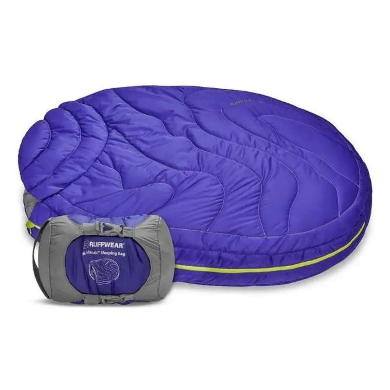 Purple dog sleeping bag with compact carrying pouch for outdoor adventures and comfort.