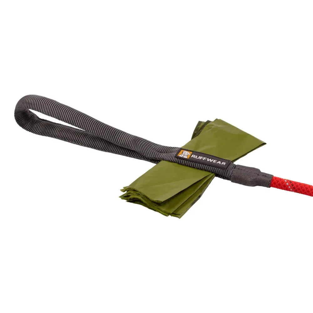 Ruffwear dog leash with waste bag dispenser and eco-friendly bags for convenient pet clean-up.
