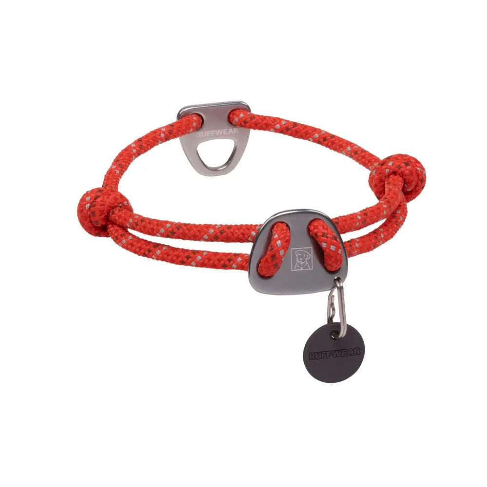 Durable red dog collar with adjustable design and secure clasp for outdoor adventures.