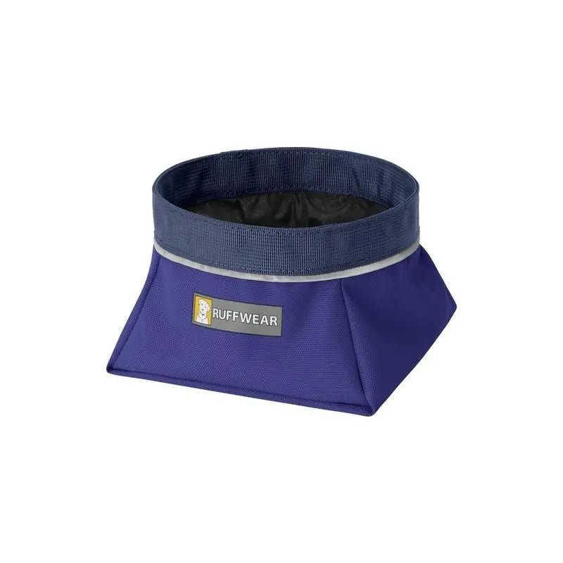 Collapsible dog bowl in purple, perfect for travel and outdoor adventures.