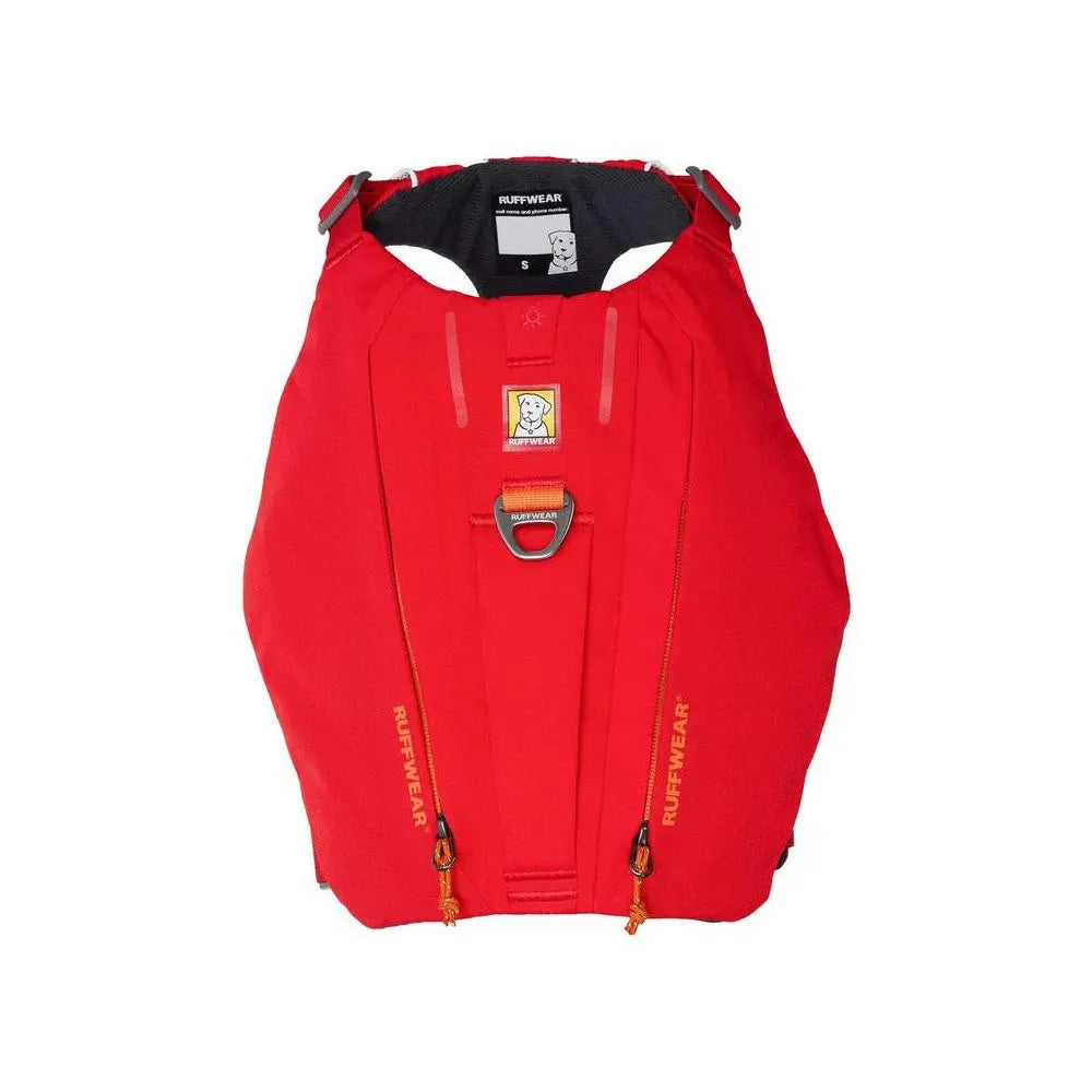 Red dog life jacket with adjustable straps and safety handle for water activities.