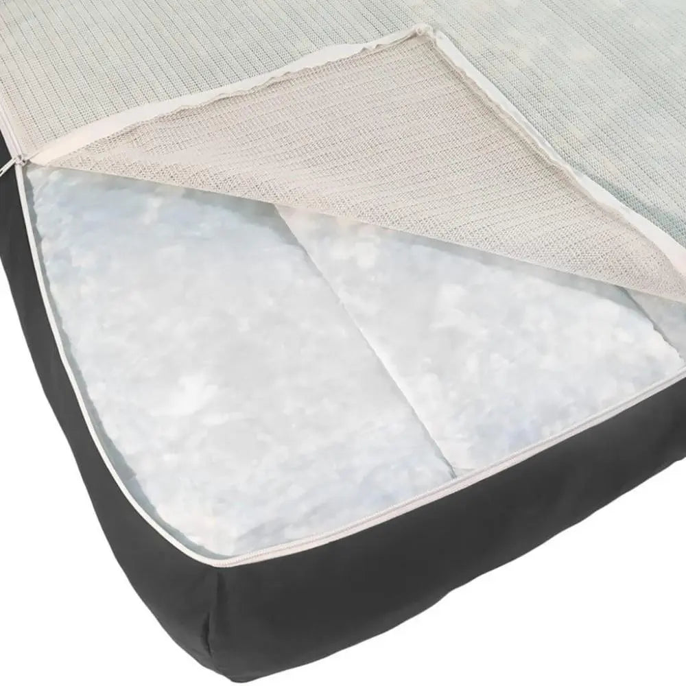 Comfortable mattress cover with breathable mesh and soft filling for enhanced sleep quality.