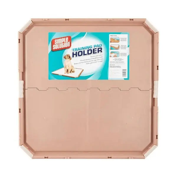 Dog training pad holder with easy-to-use design for effective pet training and mess prevention.