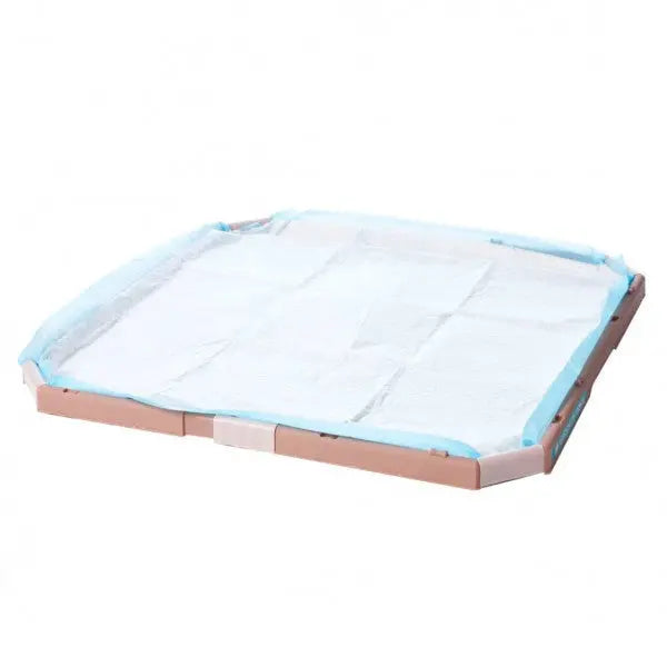 Pet training pads in a disposable tray for easy cleanup and hygiene.